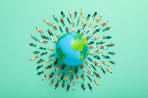 Global audience around the Earth symbolizing Mocean SMS solutions web portal for bulk messaging and campaigns without coding.