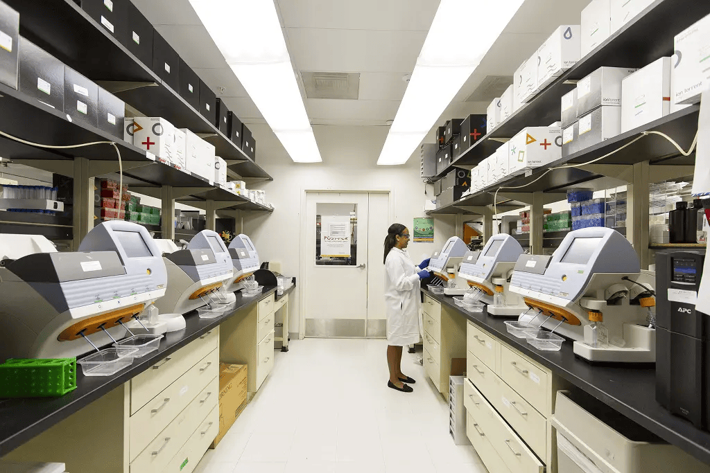 Healthcare laboratory with medical staff working, representing Mocean SMS messaging campaign for hospitals and healthcare communication.