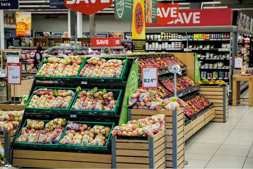 Supermarket promotion aisle showcasing discounts and offers, representing Mocean SMS messaging campaign for marketing and promotions.